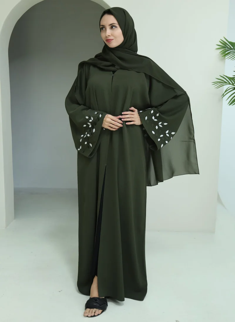 NUKHBAA Green abaya with embroidery on sleeves
