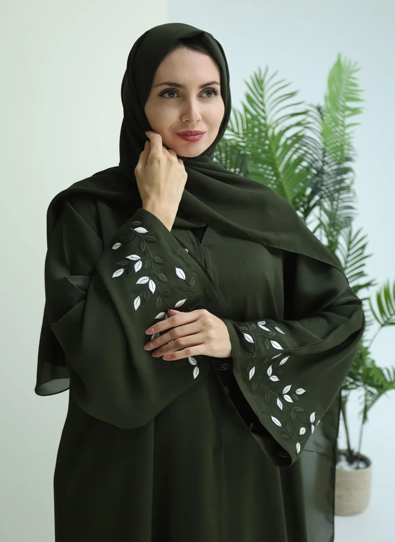 NUKHBAA Green abaya with embroidery on sleeves