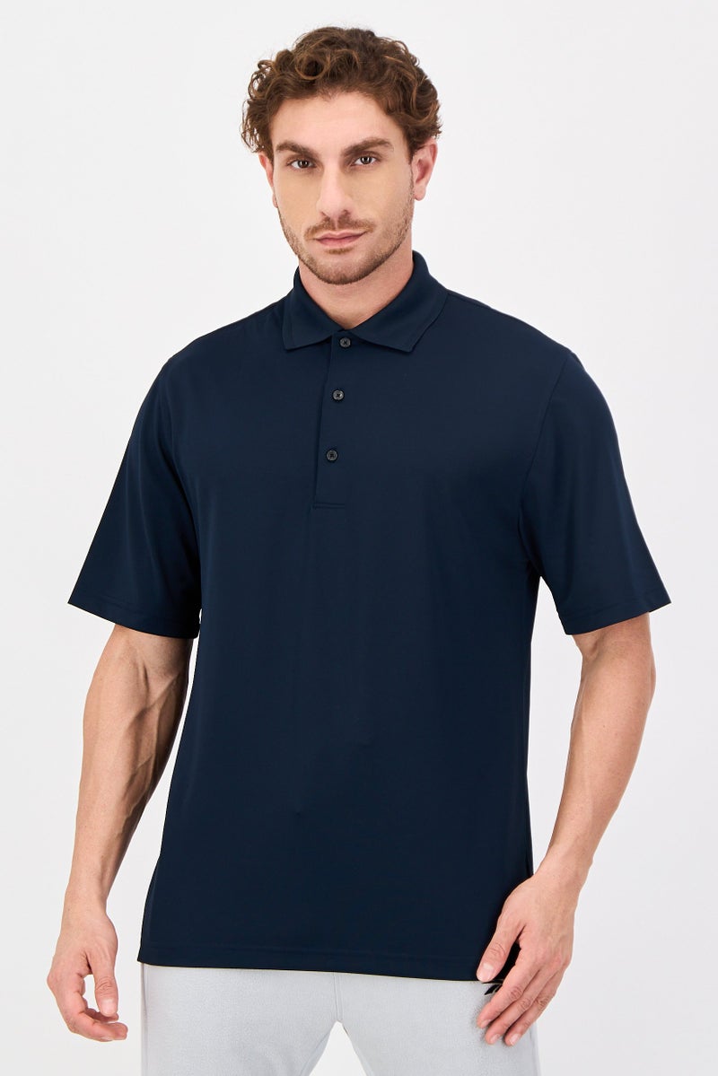 Greg Norman Men Sportswear Fit Short Sleeves Outdoor Polo Shirt, Navy - Image 1