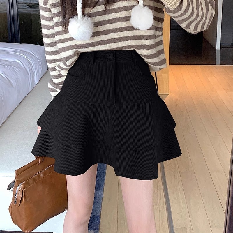 Corduroy Skirt 2024 Autumn and Winter New Irregular Design Ruffled Small Age-reducing A- line Umbrella Skirt Black (lined, anti-running)