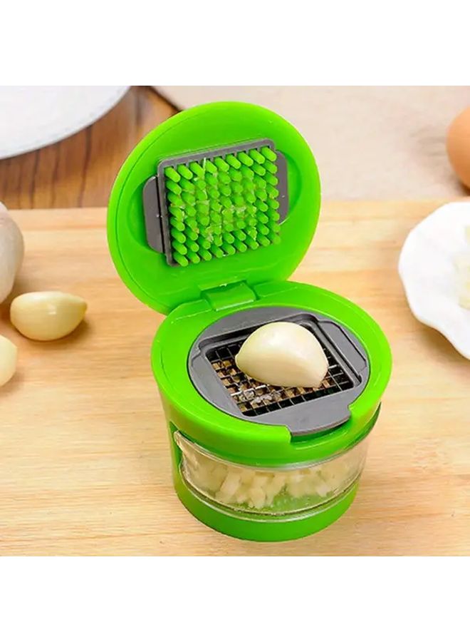 Durable Plastic Manual Garlic Press Chopper With Ergonomic Green Handle 1pc - Image 1