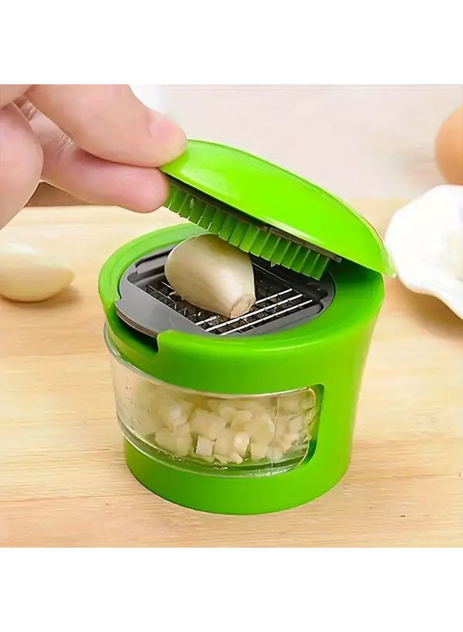 Durable Plastic Manual Garlic Press Chopper With Ergonomic Green Handle 1pc - Image 3