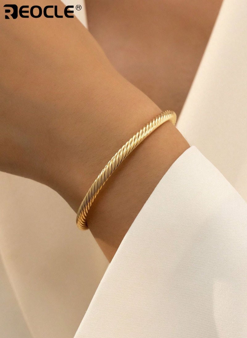 REOCLE Women's Gold-Tone Twisted Cable Bangle Bracelet Minimalist Textured Cuff Sleek Everyday Jewelry for Daily Wear and Special Occasions - Image 1