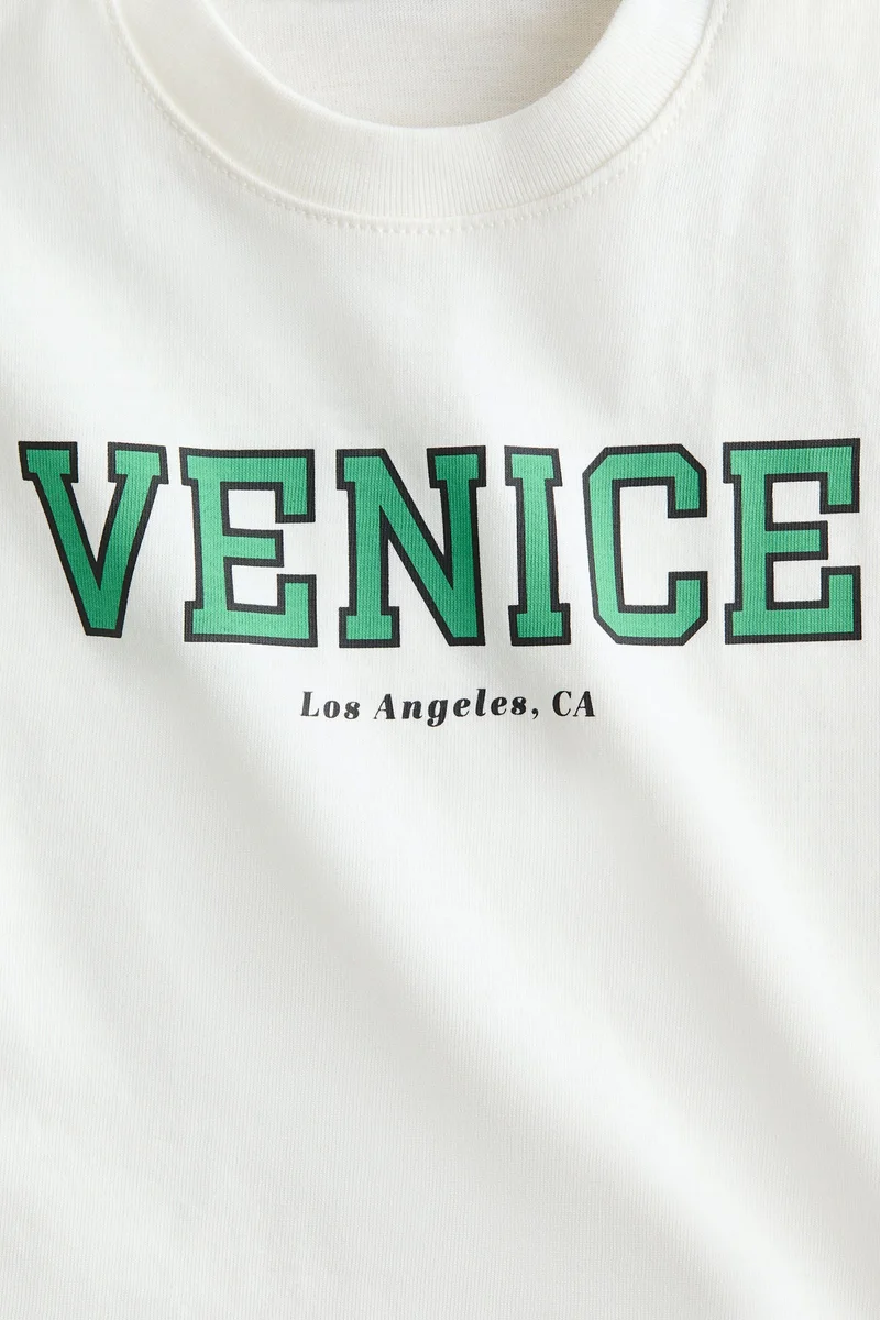 اتش اند ام تي-شيرت قطني مزين بطبعات