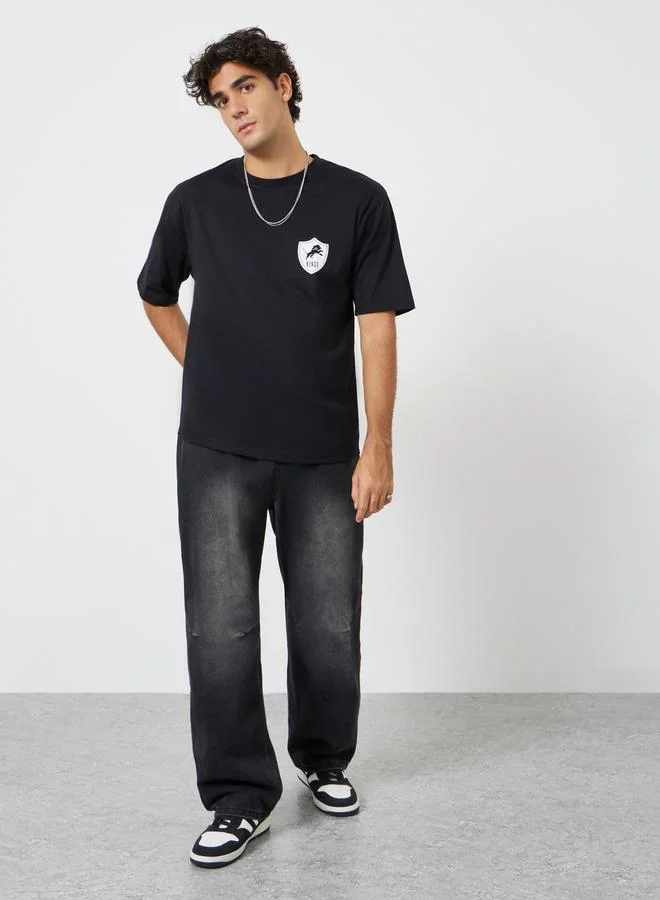 ستايلي تيشيرت جيرسي واسع بطبعة جرافيك