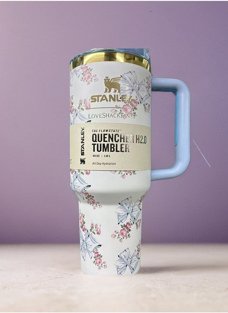 Stanley - Quencher H2.0 FlowState Stainless Steel Vacuum Insulated Tumbler with Lid and Straw for Water, Iced Tea or Coffee, Smoothie and More, 40 oz, Blue bow - Image 1