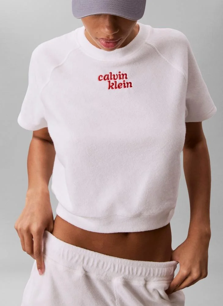Calvin Klein Jeans Bright White Cropped Terry Towelling Short Sleeve Jumper for Women | Best Price UAE