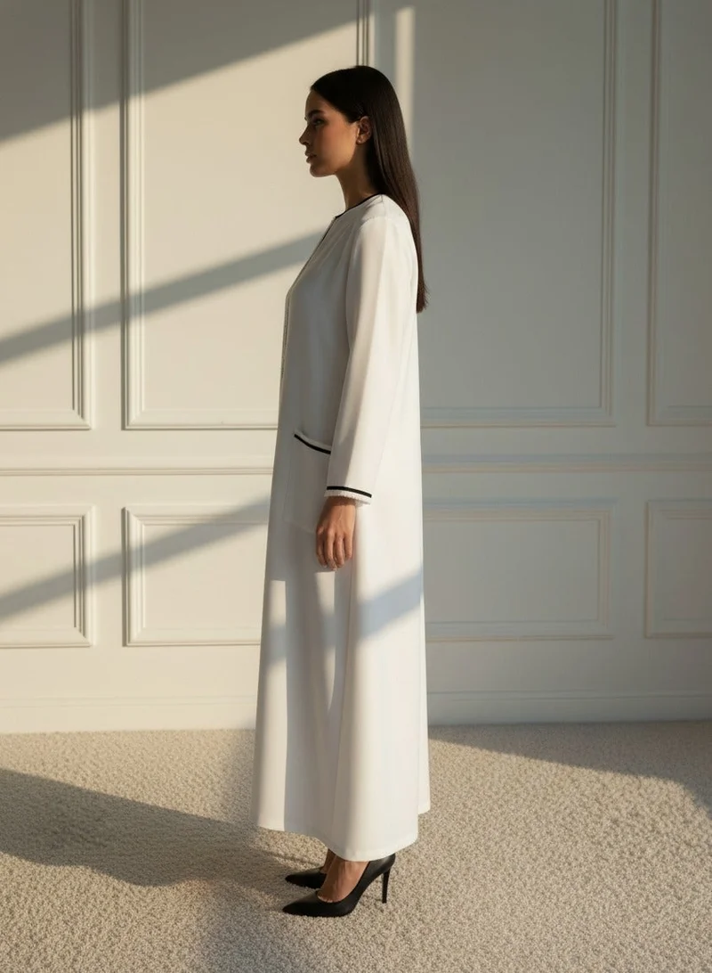 مويستريت Elegant White Barbie Crepe Abaya with Contrast Black Piping, Dual Side Pockets & Matching Headscarf