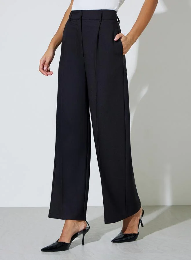 Styli  Black Solid Tailored Wide-Leg Trousers for Women | Best Price UAE
