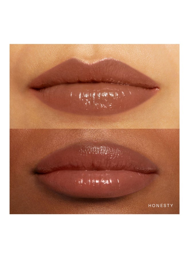 رير بيوتي زيت الشفاه الملون سوفت بينش من رير بيوتي باي سيلينا غوميز، لون أونستي، 0.10 أونصة سائلة (عبوة واحدة) - Image 3