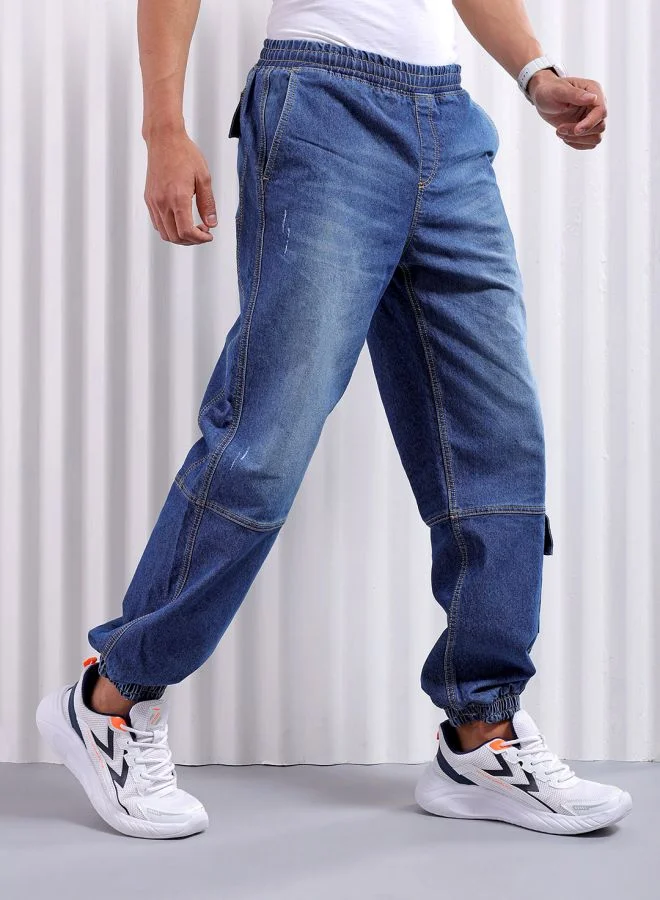 شركة المرآب الهندية Men Loose Fit Solid Mid-Rise Stretchable Denim Joggers