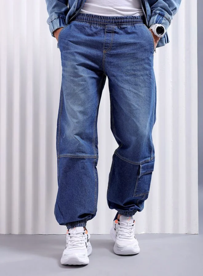 شركة المرآب الهندية Men Loose Fit Solid Mid-Rise Stretchable Denim Joggers