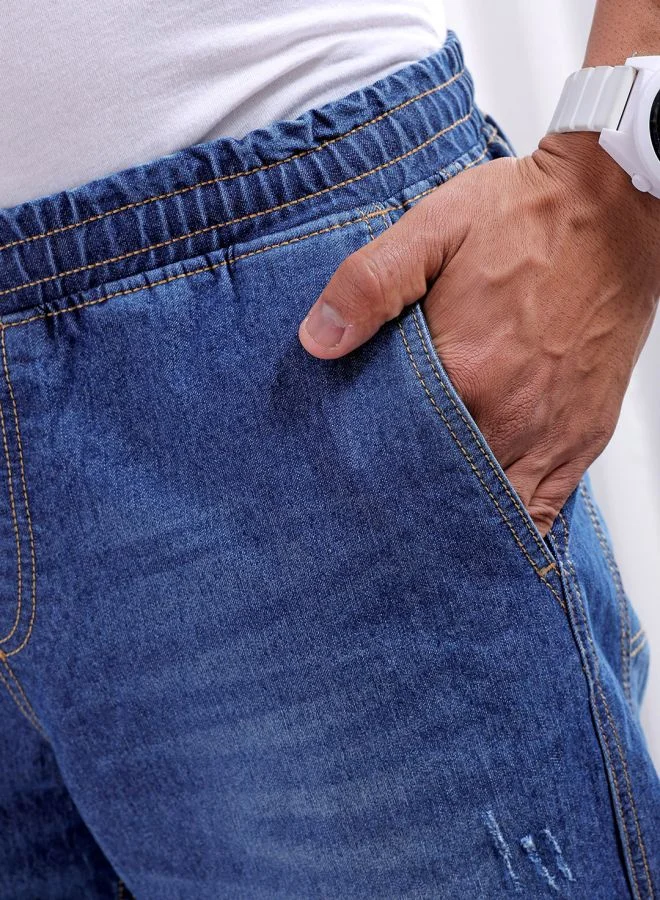 شركة المرآب الهندية Men Loose Fit Solid Mid-Rise Stretchable Denim Joggers