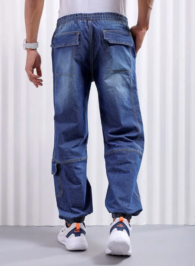 شركة المرآب الهندية Men Loose Fit Solid Mid-Rise Stretchable Denim Joggers