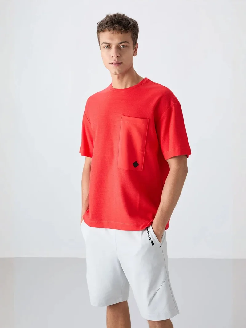 تومي لايف TOMMY Oversized Cotton-Blend Crew Neck T-Shirt With Pocket