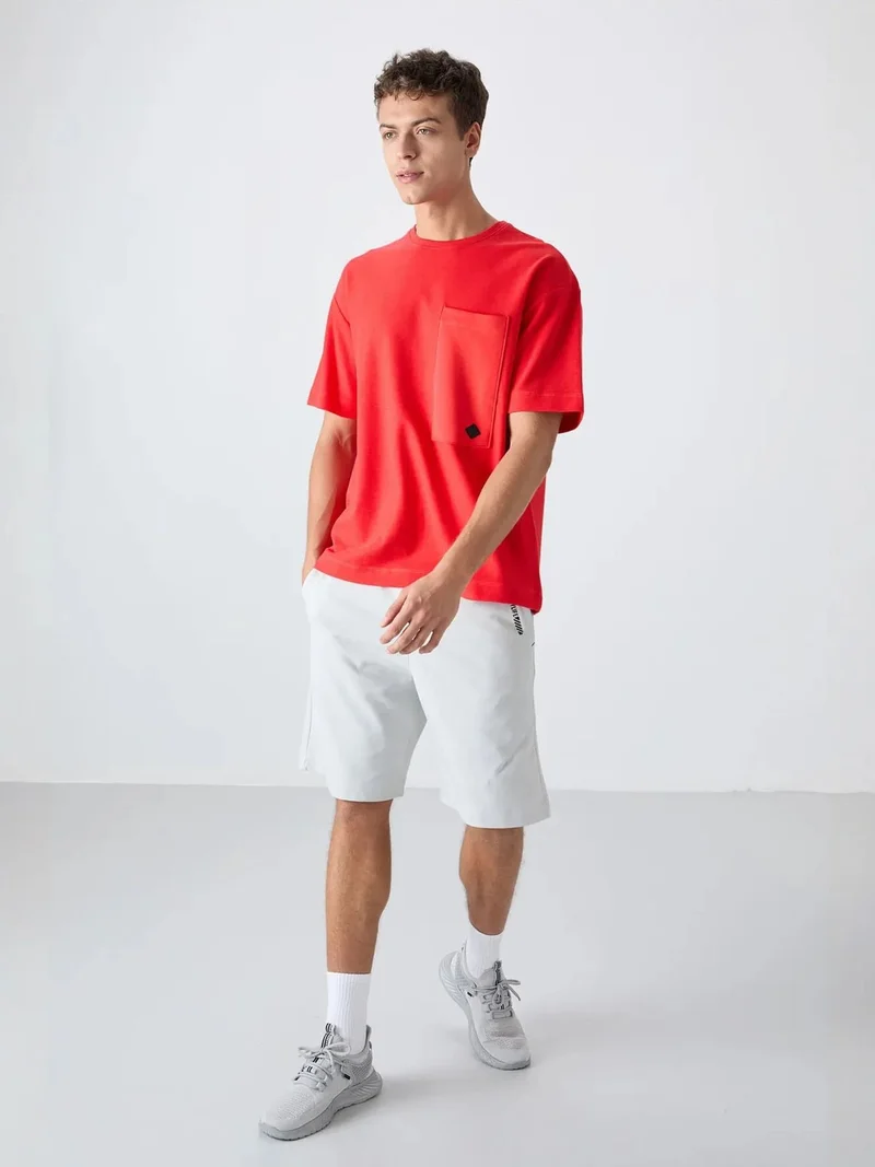 تومي لايف TOMMY Oversized Cotton-Blend Crew Neck T-Shirt With Pocket