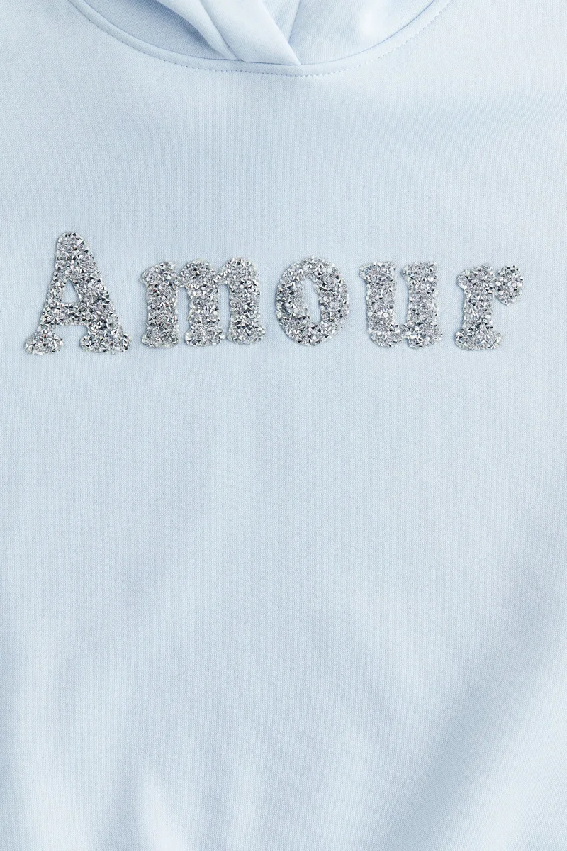 اتش اند ام هودي فضفاض مزخرف