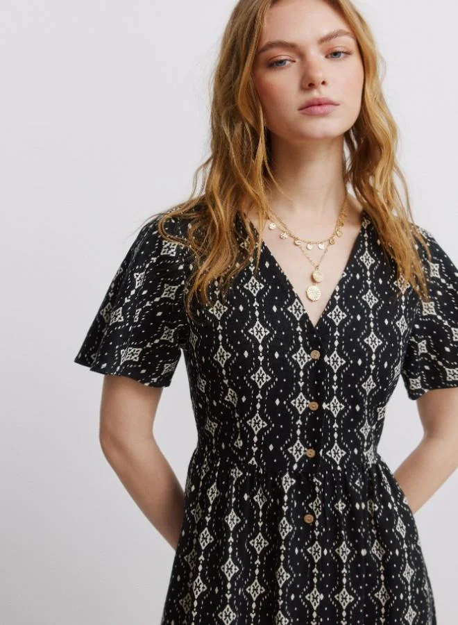 Springfield  Printed short sleeve shirt collar V-neck front button flared skirt midi dress for Women | Best Price UAE