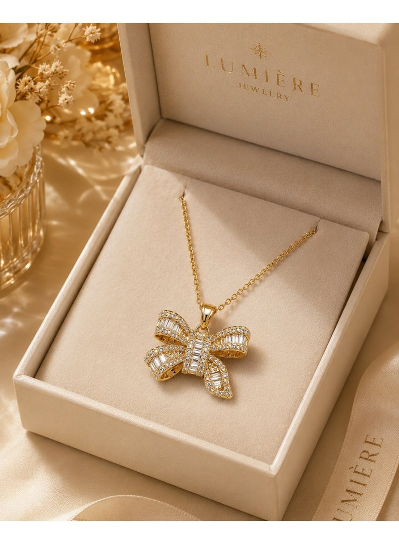 RAFAL Golden Bow Women's Gold-Tone Pendant Necklace with Baguette-Cut Clear Crystals - Image 2