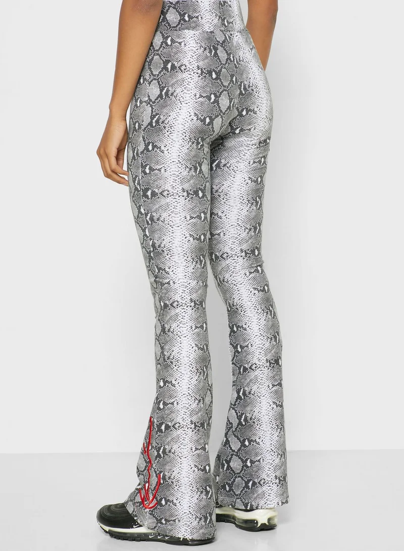 Karl Kani Signature Snake Print Flared Pants