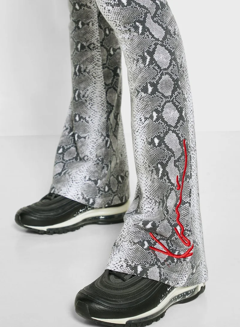 Karl Kani Signature Snake Print Flared Pants