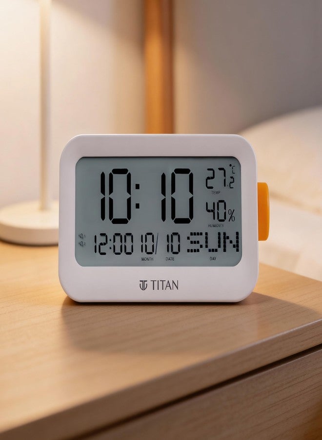 تيتان ساعة منبه تايتان - شاشة LCD رقمية تعرض اليوم والتاريخ والشهر ودرجة الحرارة والرطوبة، مع زر دوار لضبط الوقت، مقاس 14 × 12.5 × 6 سم - T0006PD01 - Image 1