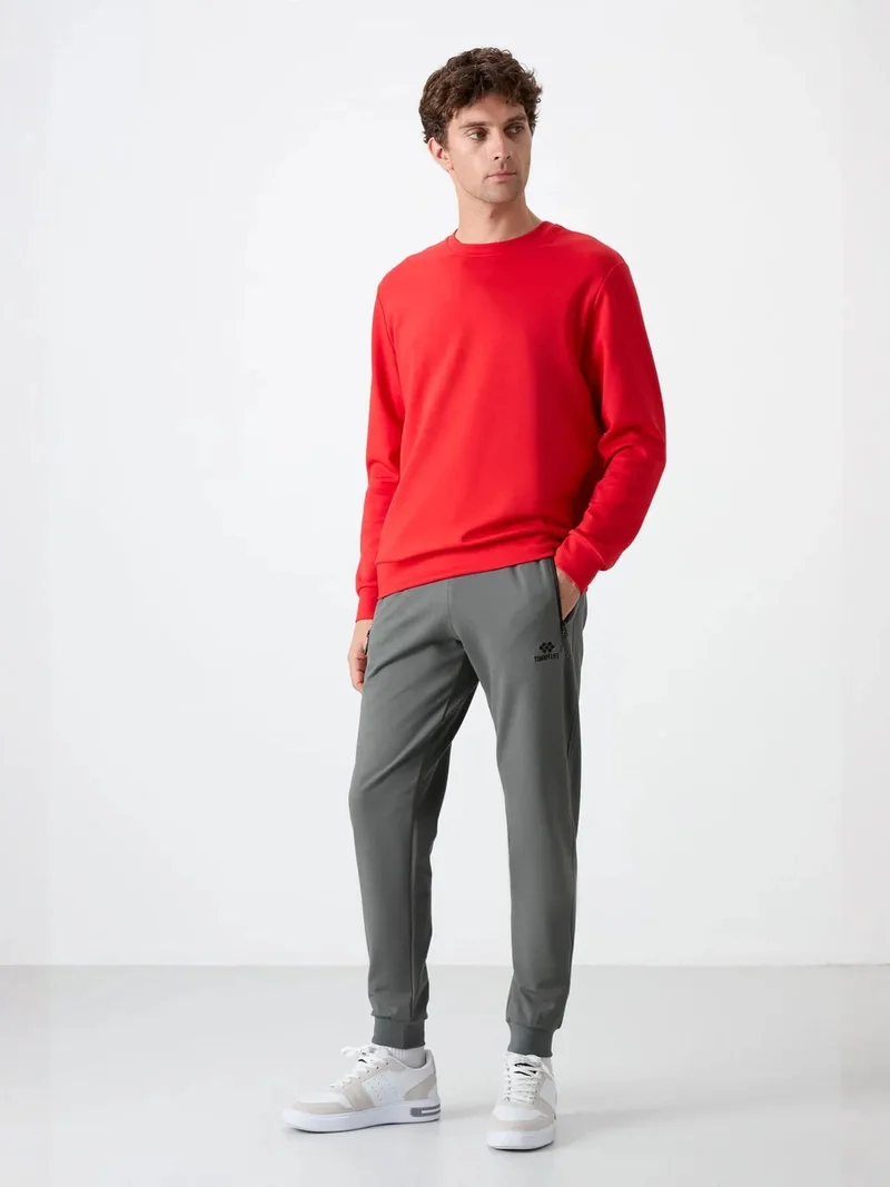 تومي لايف TOMMY Men's Solid Pull-on Sweatpants With Zip Pocket
