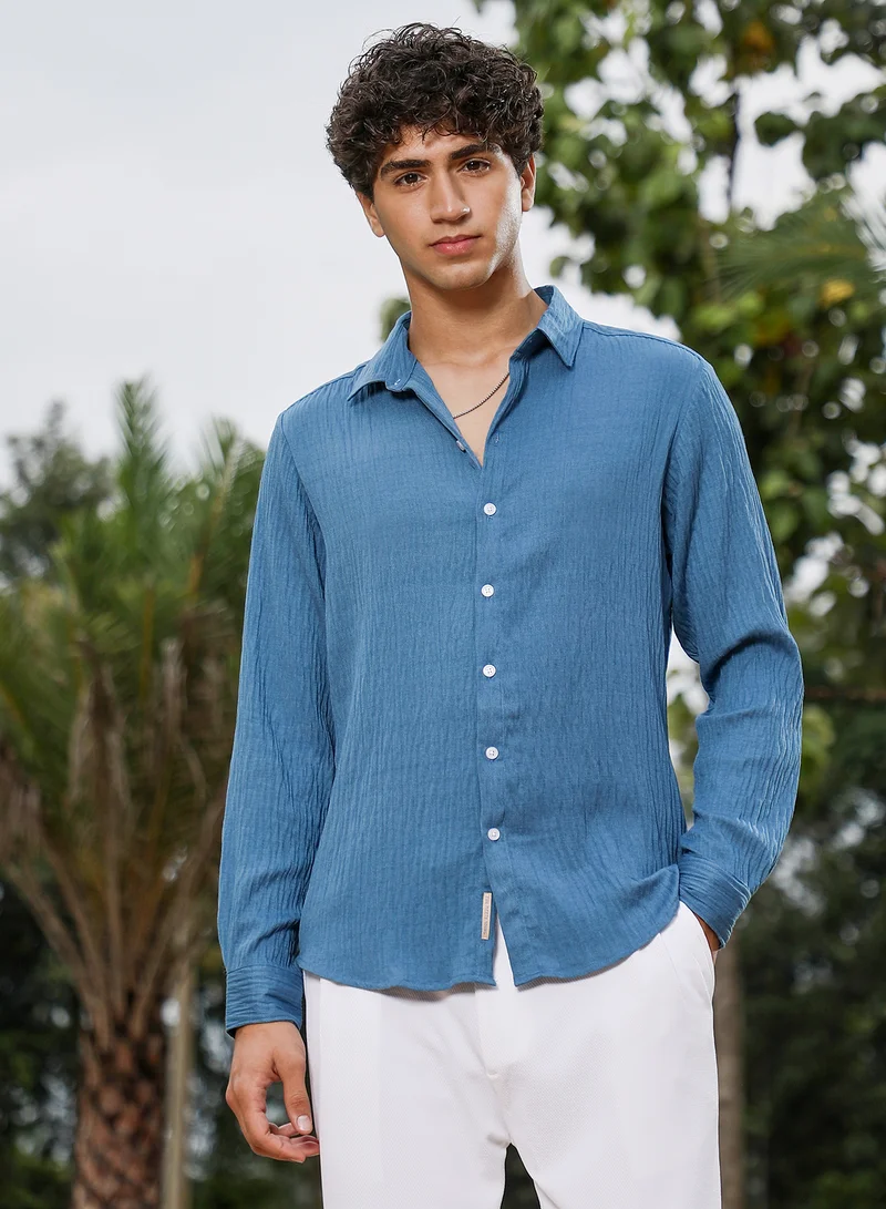 كامبوس سوترا Campus Sutra Men Solid Creased-Tactile Shirt | Spread Collar Long Cuffed Sleeves | Button Closure Curved Hem | Solid Creased | Woven Fabric For Casual & Daily Wear | Ocean Blue