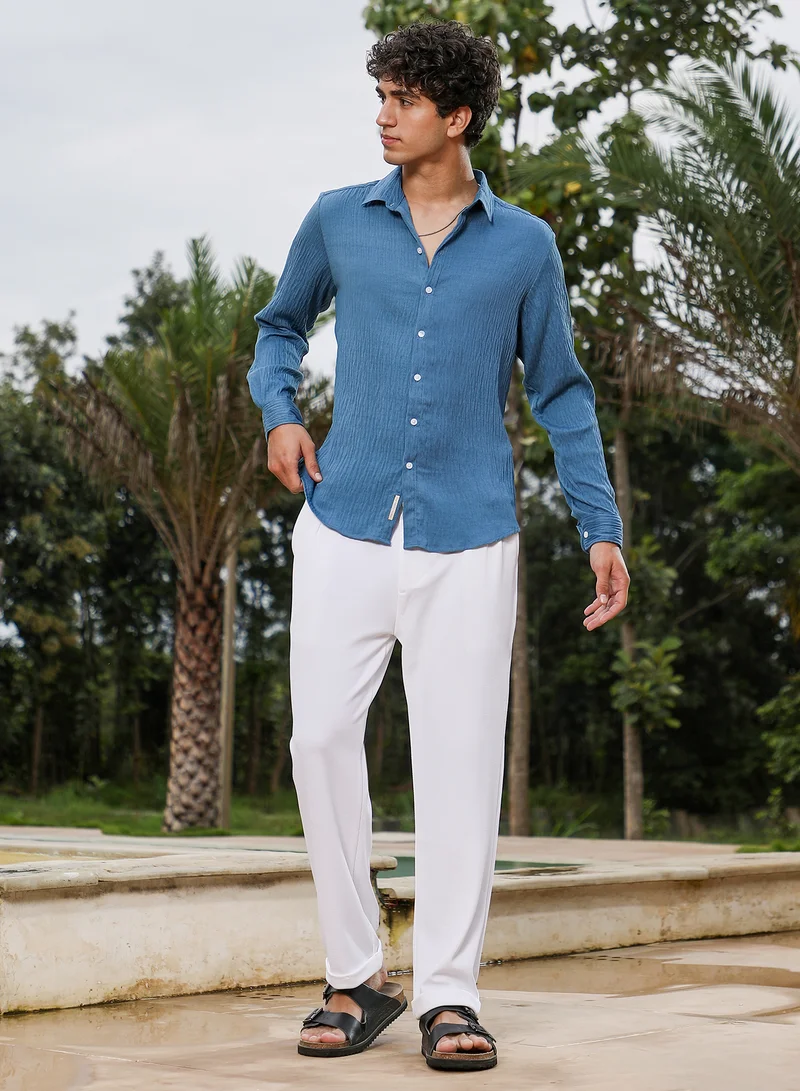 Campus Sutra Campus Sutra Men Solid Creased-Tactile Shirt | Spread Collar Long Cuffed Sleeves | Button Closure Curved Hem | Solid Creased | Woven Fabric For Casual & Daily Wear | Ocean Blue
