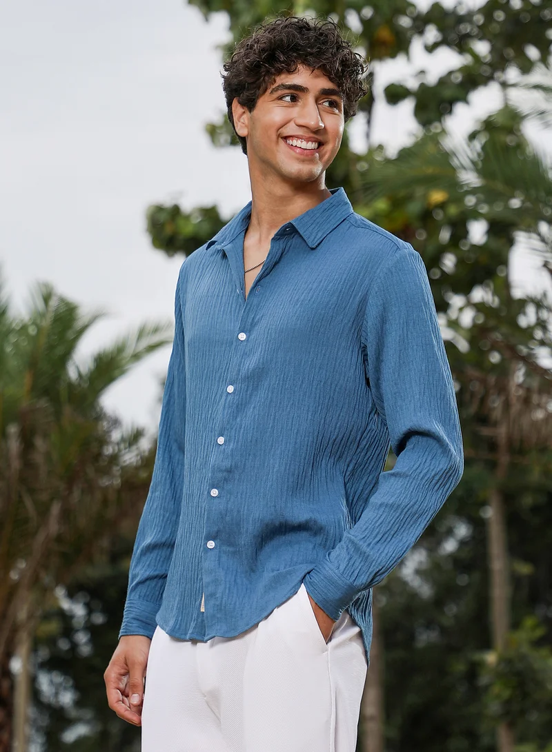 Campus Sutra Campus Sutra Men Solid Creased-Tactile Shirt | Spread Collar Long Cuffed Sleeves | Button Closure Curved Hem | Solid Creased | Woven Fabric For Casual & Daily Wear | Ocean Blue