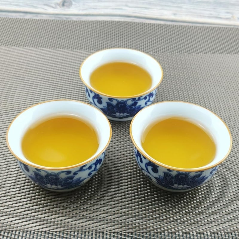 Woonsoon Chinese Handmade Kungfu Tea Cup 60 mlBone China Blue and White Tea Cups Set of 12Ceramic Tea Mugs Without HandlesBest GiftLotus - Image 5