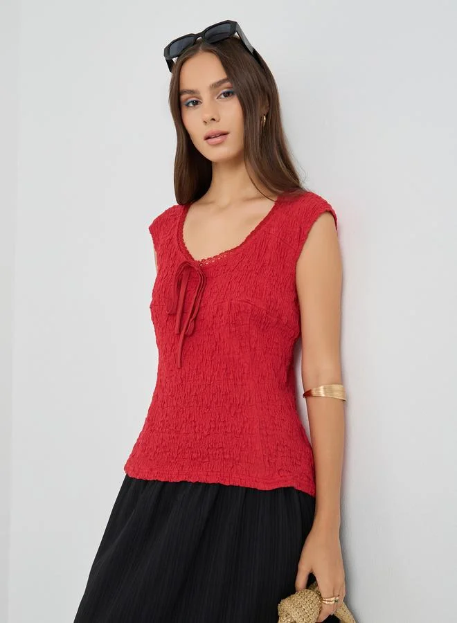 Take Two Take Two Textured Sleeveless Tie-Up Detail Blouse