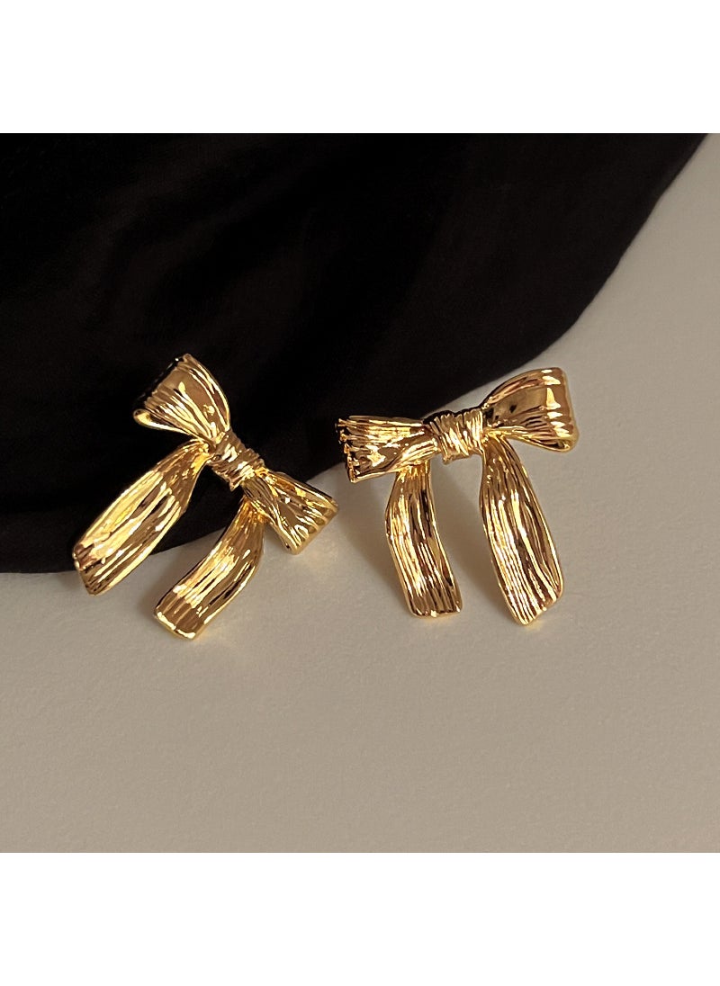 Generic - French Retro Metal Butterfly Knot Earrings Light Luxury Small Design Temperament Earrings Girls Color Korean Style Golden Bow Stud Earrings - Image 1