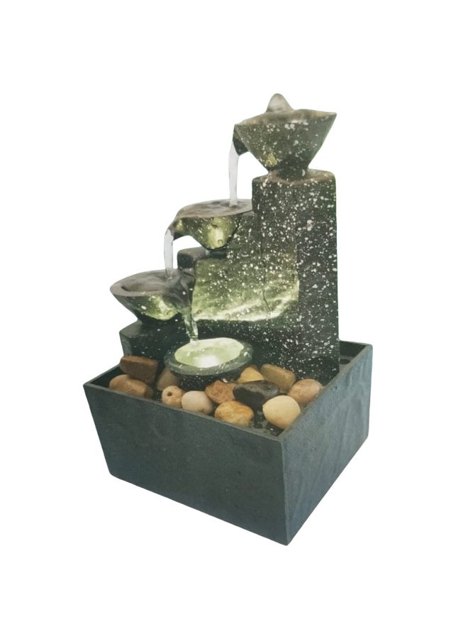 A tabletop fountain and waterfall with LED lighting and natural river stones. Battery operated. - Image 2