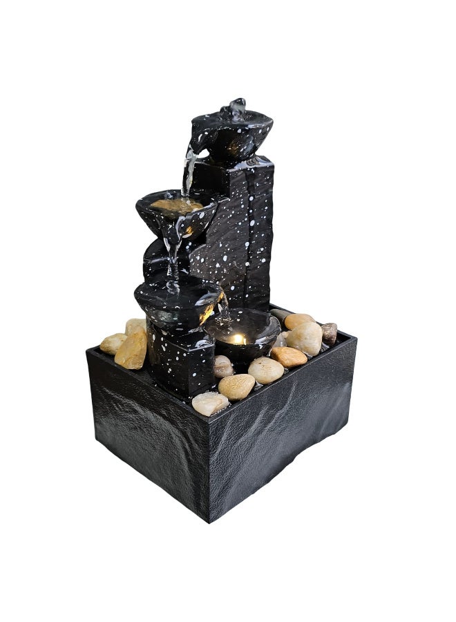 A tabletop fountain and waterfall with LED lighting and natural river stones. Battery operated. - Image 4