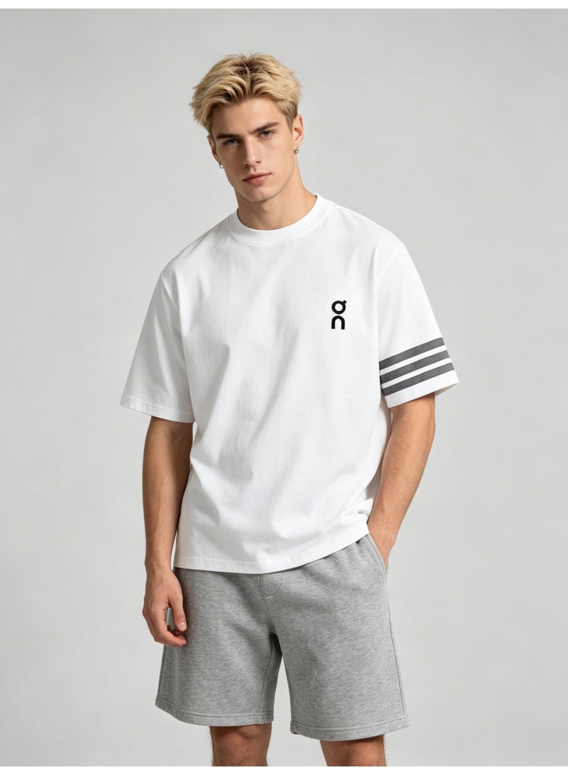 On Running Men’s White Crew Neck Short Sleeve T-Shirt with Black Logo & Three Grey Sleeve Stripes - Image 1