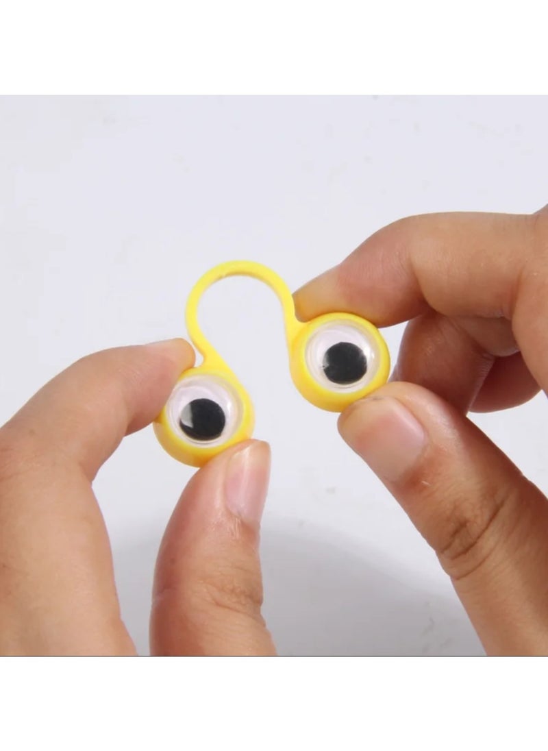 Generic - 6 Pieces of Funny Moving Eyes Finger Puppet Rings Plastic for Kids Useful at School, Home or Funny Video Studio Useful for Telling and Creating Comic Story Characters as a Kind of Fun and Joy for Kindergarten or Nursery Children Useful for Kindergarten and Nursery Teachers or Parents to Add a Time of Funny Fun for Their Children or to Train Children to Move Their Fingers Also Useful for Social Media Filming Clips as a Comedy or Advertising Video Clip The Set in a Bag Contains 6 Pieces in Various Colors Blue Pink Green Red Yellow and Purple - Image 1