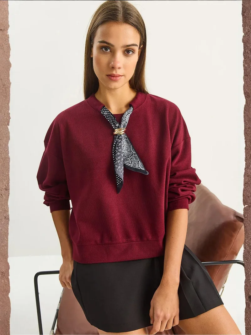 Bianco Lucci Burgundy Red Crew Neck Ribbed Sweatshirt with Scarf Accessory Detail for Women | Best Price UAE