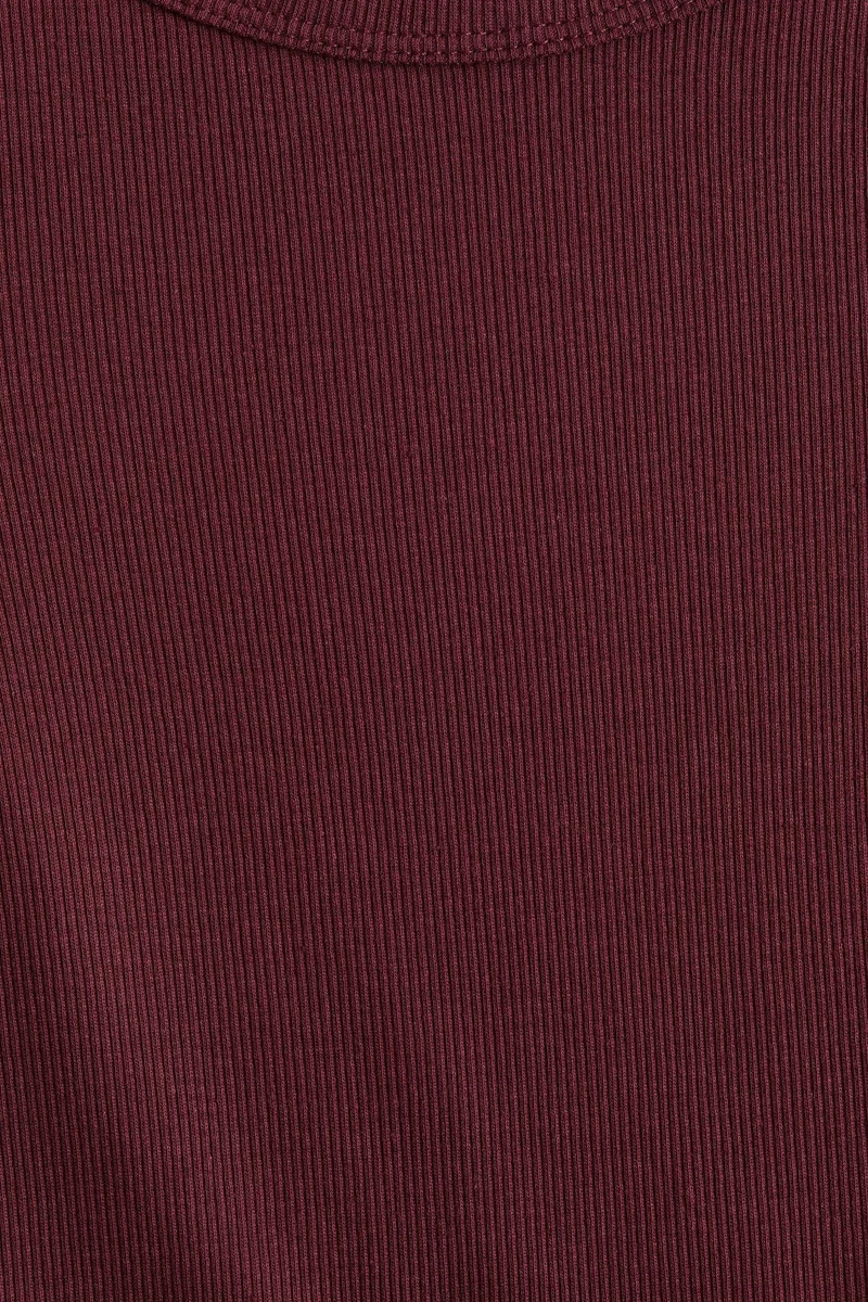 اتش اند ام بلوزة من قطن الجيرسيه بتصميم مرن