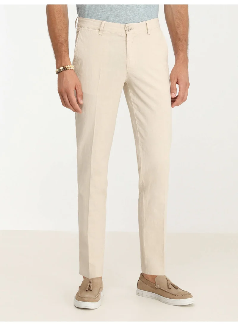 Kip Beige Woven Slim Fit Casual Cotton Blend Trousers