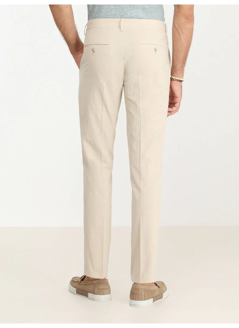 Kip Beige Woven Slim Fit Casual Cotton Blend Trousers