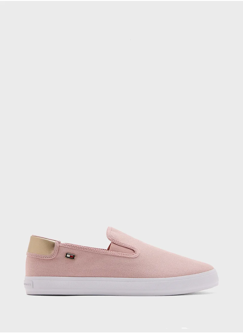 تومي هيلفيغر VULCANISED CANVAS SLIP ON TRAINERS