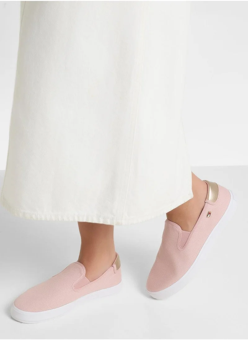 تومي هيلفيغر VULCANISED CANVAS SLIP ON TRAINERS