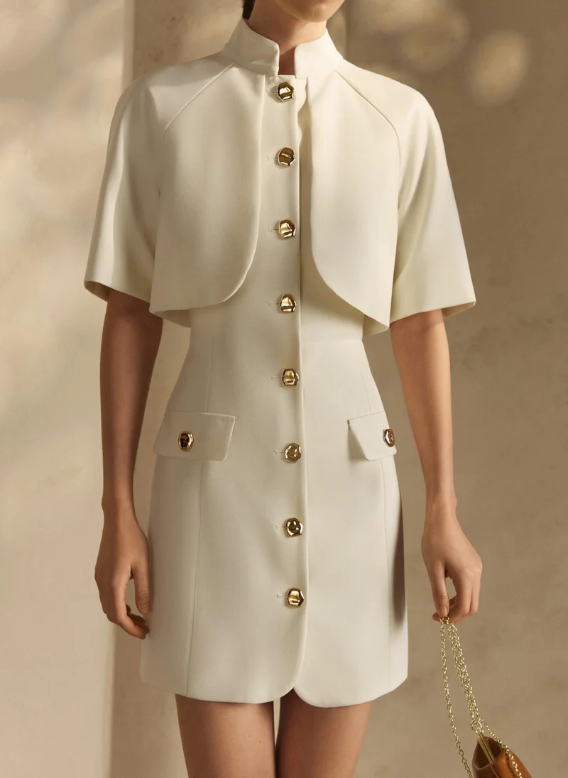 Mini dress with stand-up collar and cape imitation