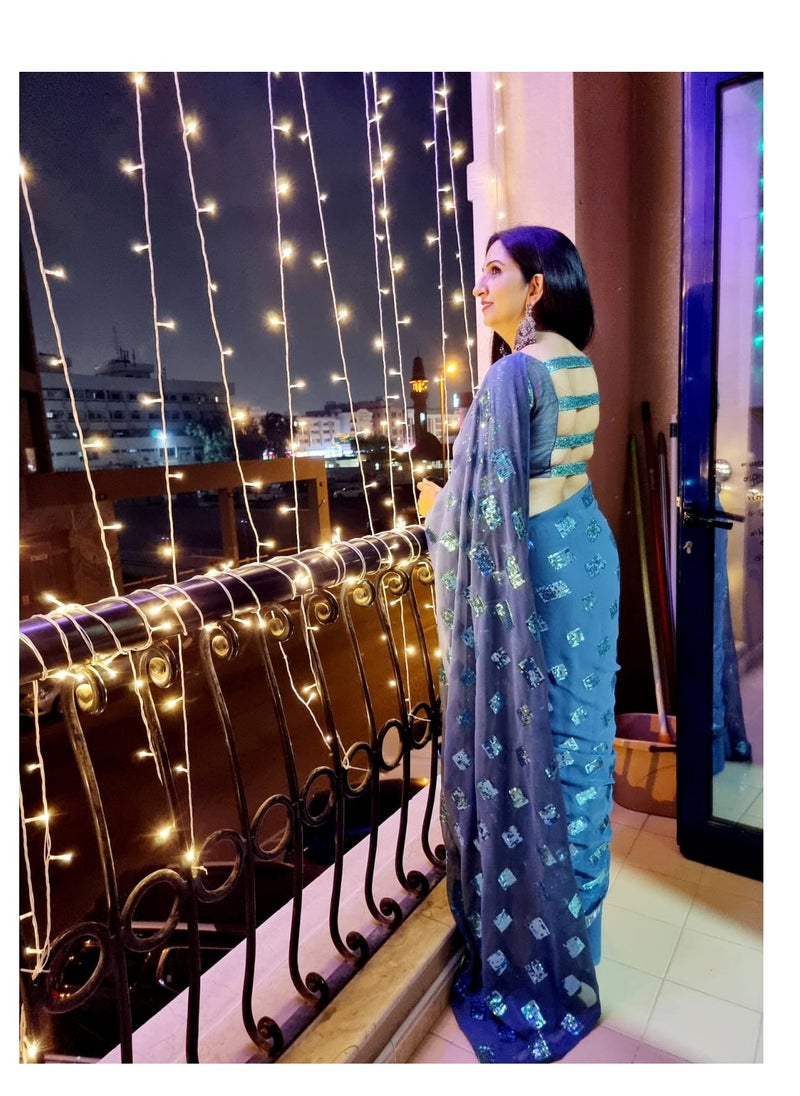 Grab Mantra - Grey Georgette Saree With Blue Sequence Work And Piping Finish Plus Unstitched Blouse - Image 1