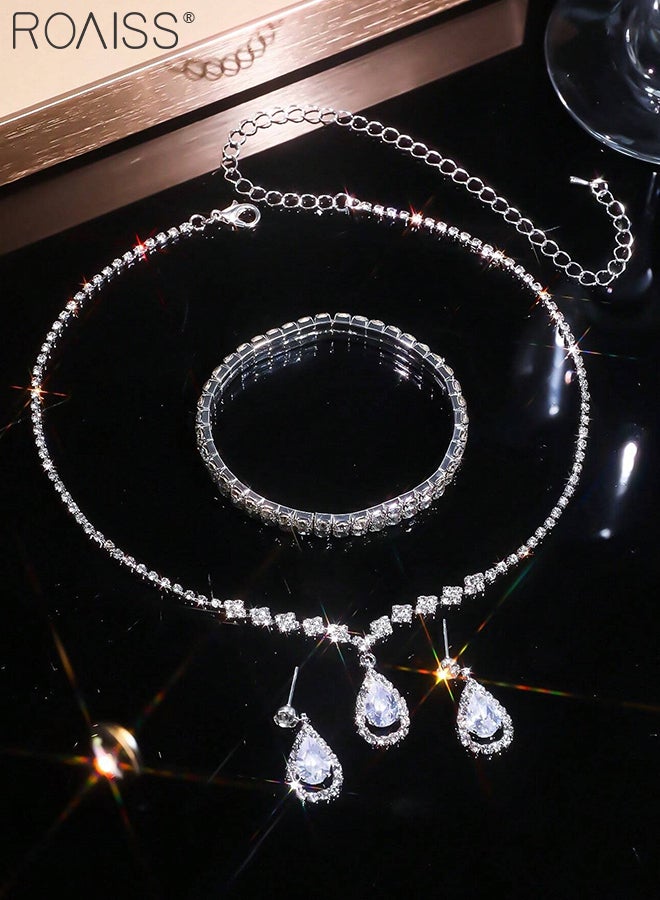 رويس مجموعة مجوهرات أنيقة مكونة من 4 قطع من القلائد والأساور، مجموعة مجوهرات زفاف من الكريستال اللامع، قلادة فضية أنيقة مرصعة بأحجار الراين، أقراط متدلية من الكريستال على شكل دمعة، مجموعات مجوهرات تنكرية لحفلات الزفاف وحفلات التخرج - Image 2