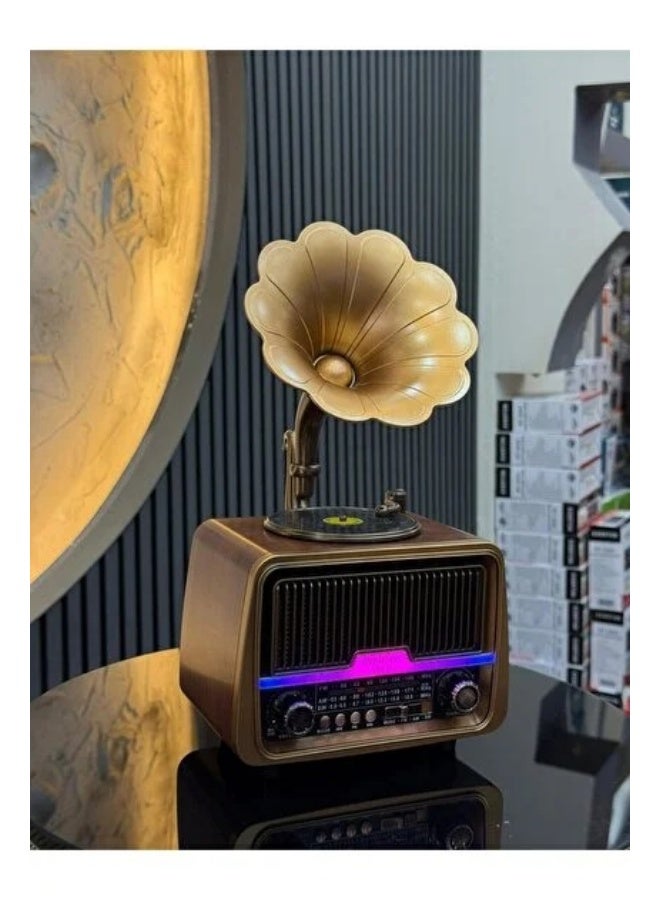 A classic radio featuring a vintage "gramophone" design that blends the charm of the past with modern audio technology. It supports three-band broadcasting (FM/AM/SW) and includes Bluetooth connectivity for streaming audio from mobile devices. Connectivity and Media: It features a USB port for playing content from flash drives and a slot for TF memory cards. Design and Decor: It boasts a premium exterior with a wood-effect finish and a gold-colored metal horn—mimicking the design of antique gramophones—adding an elegant, aesthetic touch to your home decor. - Image 3