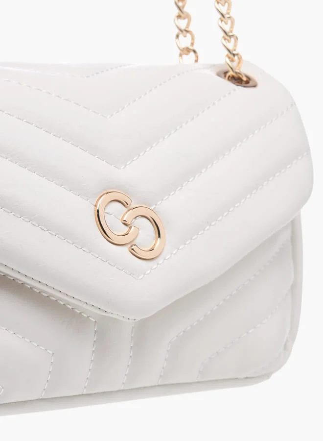 Celeste Womens Quilted Crossbody Bag With Button Closure And Chain Strap