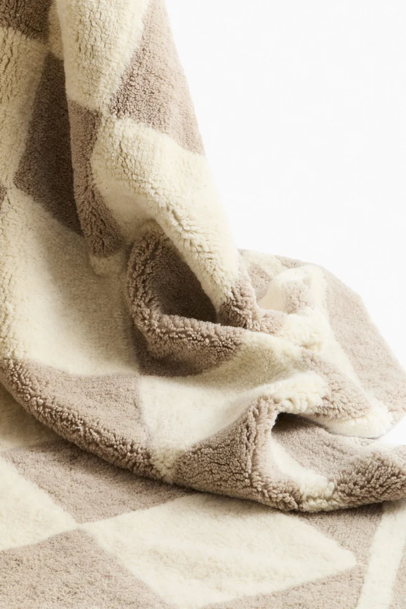 H&M Harlequin-patterned wool-blend rug