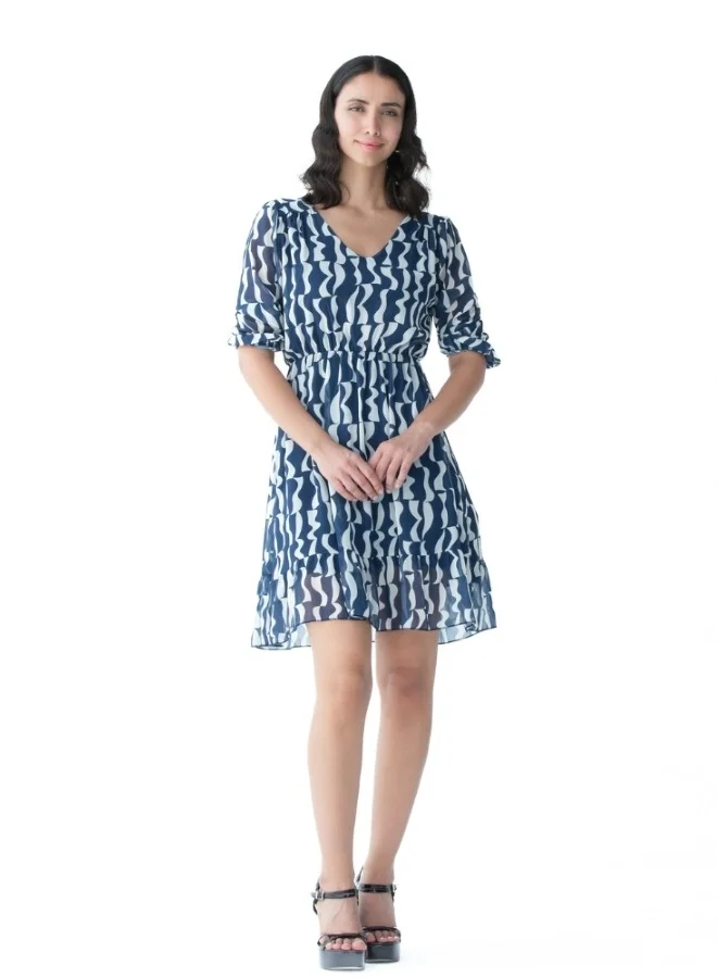 زابايوني This elegant dress features a unique blue pattern, perfect for casual and formal occasions.